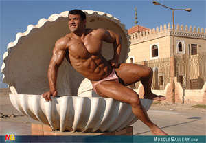 We met Said El Koley Saad after his participation at the Mediterranean Championships in 2005. With amazing balance of symmetry, size and power Said became one of Egypt's top bodybuilders. By the way, due to their superior athletes and the popularity of bodybuilding in Egypt, it's not surprising that Egypt emerged as the best IFBB team in both 2006 and 2007. In 2007 Said participated at the IFBB World Championships in South Korea. We shot Said in June 2007 in Port Said (Suez Canal) after he competed in local championships.